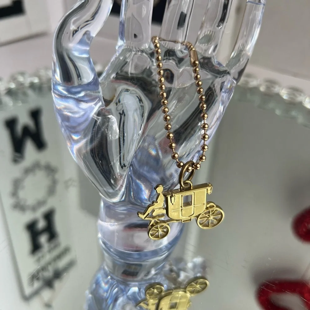 Coach Gold Carriage Key Holder